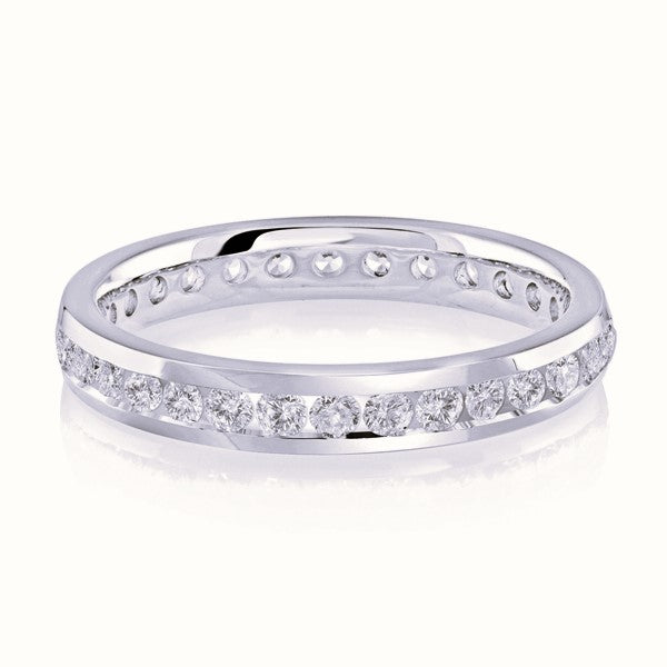 White gold wedding band with diamond accents on a white background.