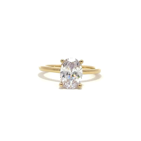 Front view of gold engagement ring with a oval-cut center diamond.