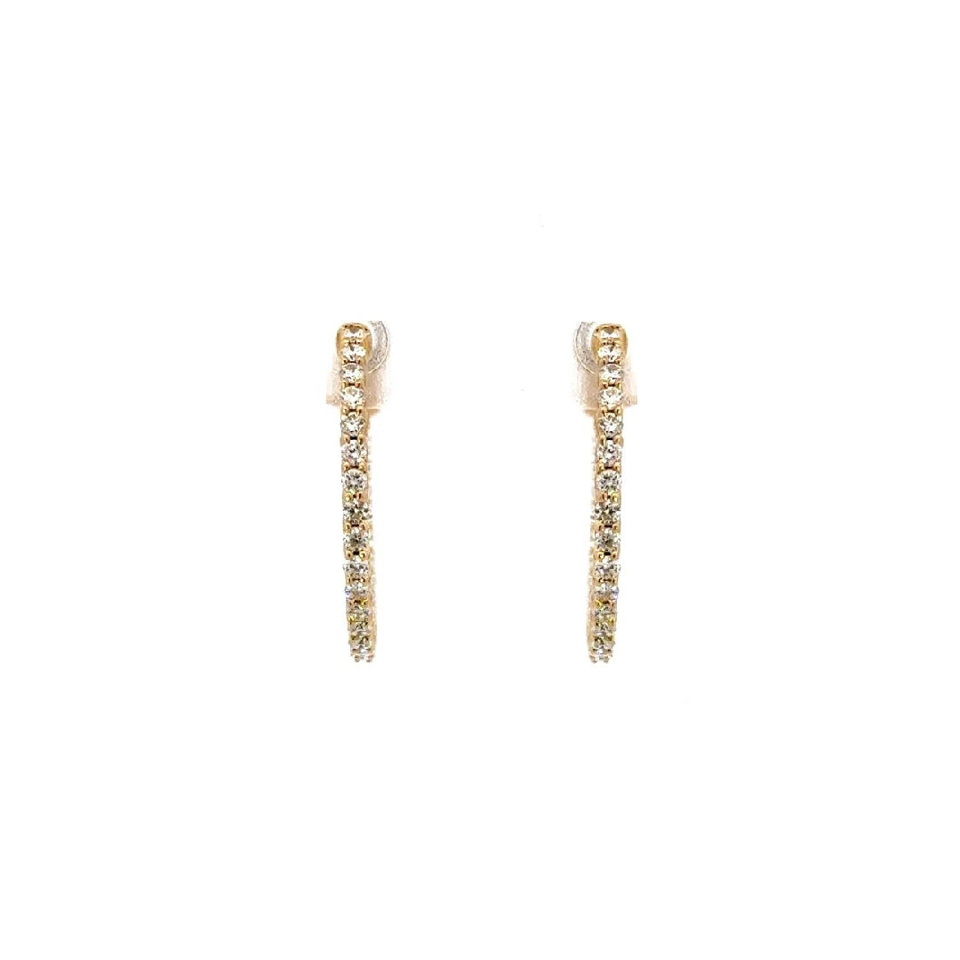 Pair of gold diamond earrings on a white background