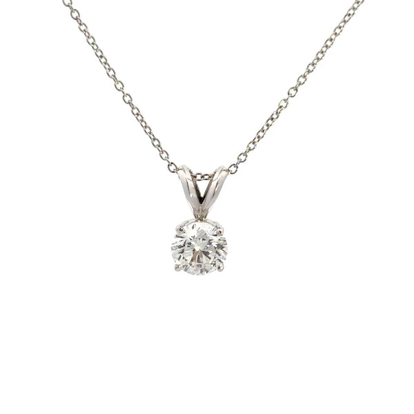 Silver necklace with round cut diamond pendant on a white background