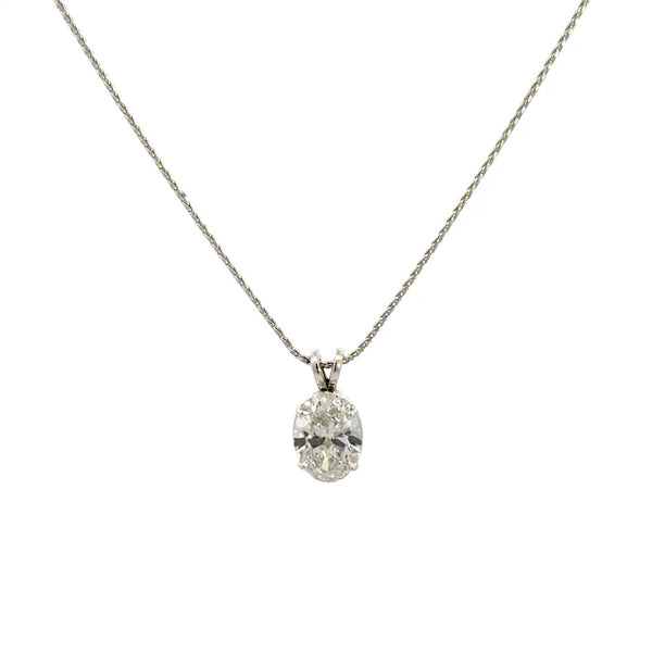 Front view of silver necklace with oval cut diamond pendant