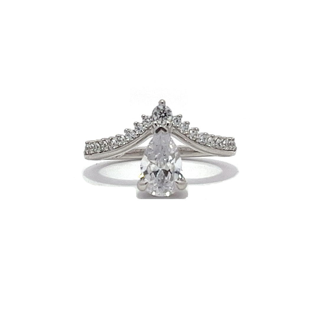 White gold pear-shaped diamond engagement ring with a diamond band on a white background