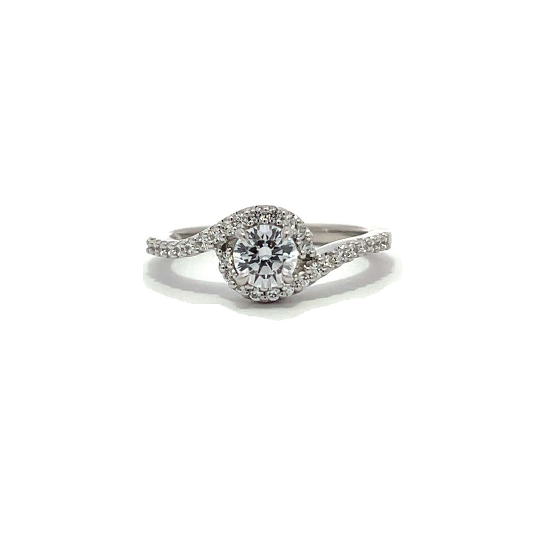 White gold diamond engagement ring with a halo setting and a split shank on a white background.