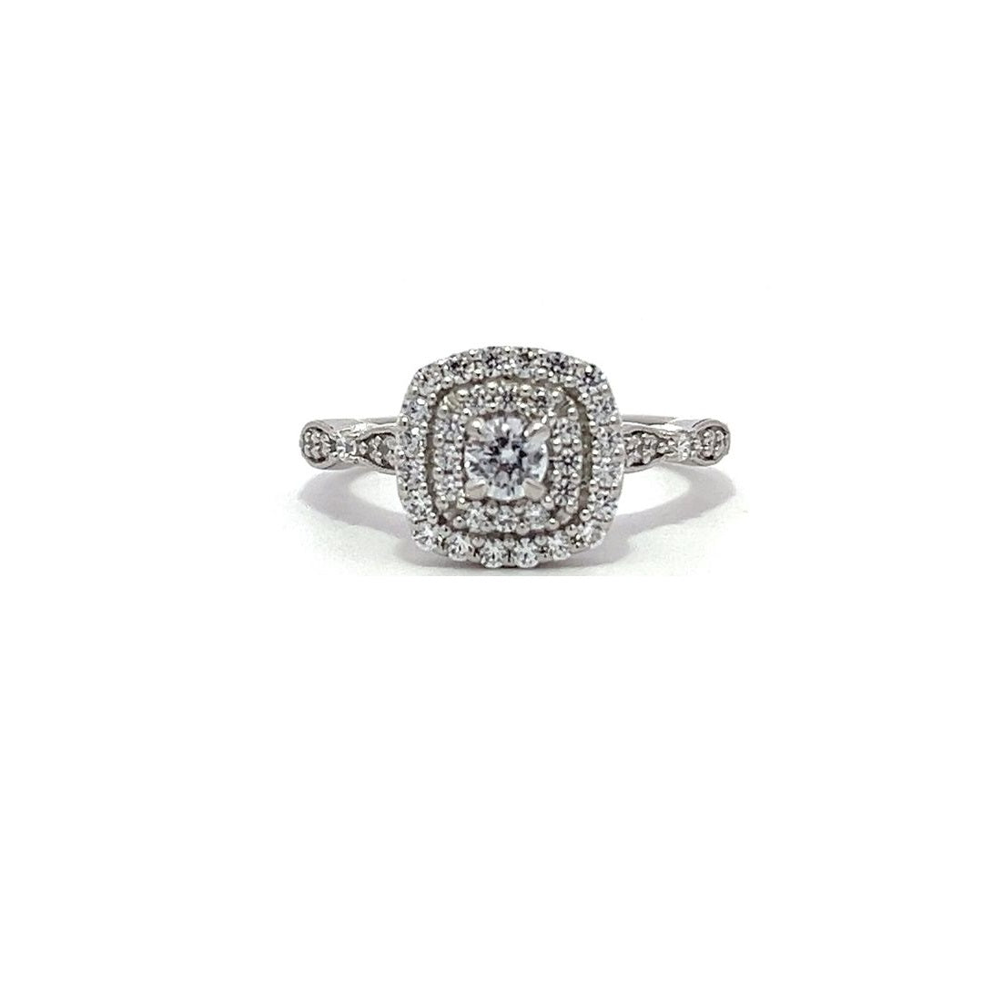 White gold diamond engagement ring with a double halo setting on a white background.