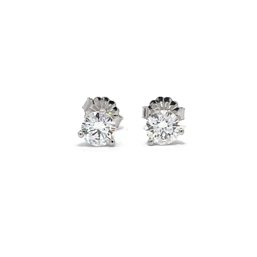 White gold stud earrings with round diamonds on a white background.