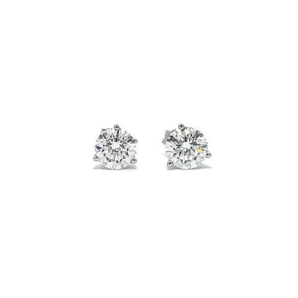 White gold stud earrings with round diamonds on a white background.