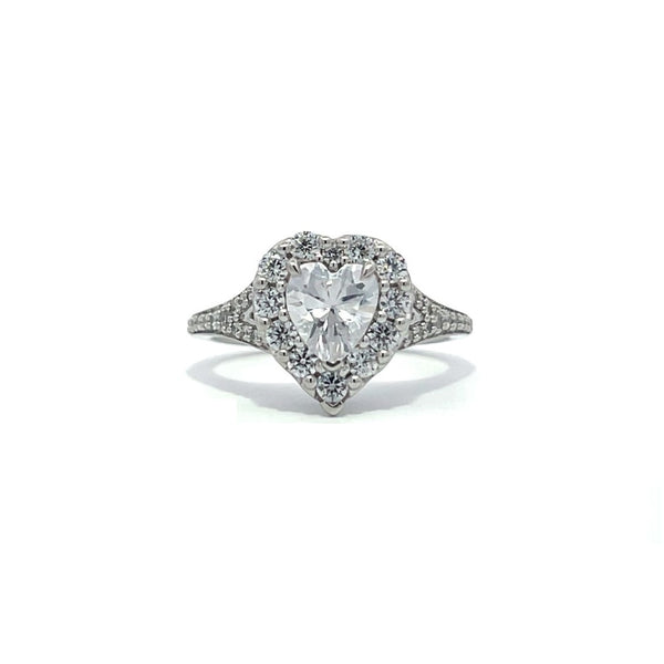 Silver heart-shaped diamond engagement ring with a halo setting and split shank on a white background.