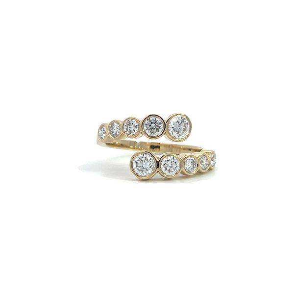 Yellow gold ring with two rows of bezel round diamonds, on a white background.