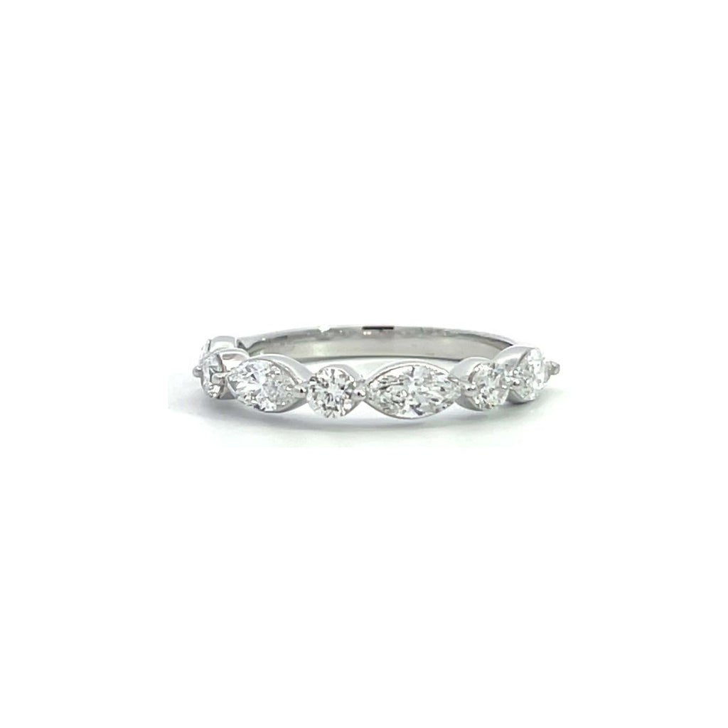 Silver eternity band with alternating round and marquise-shaped diamonds, on a white background.