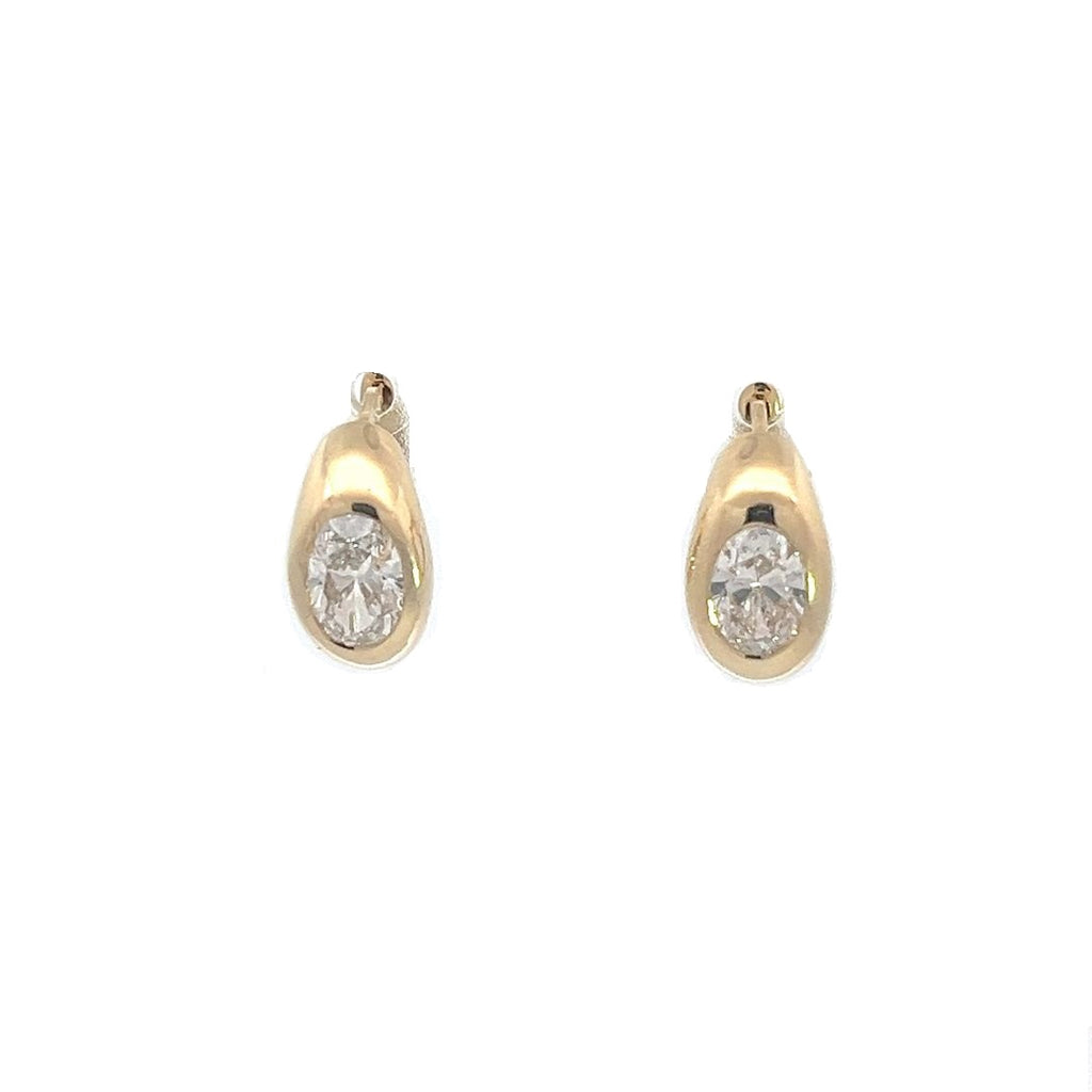 Yellow gold drop earrings with round diamonds in a pear-shaped setting, on a white background.