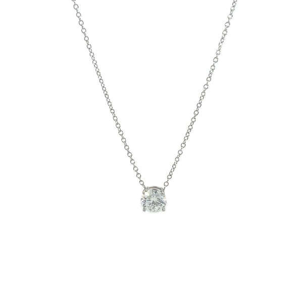 Silver necklace with a round diamond solitaire pendant on a white background.