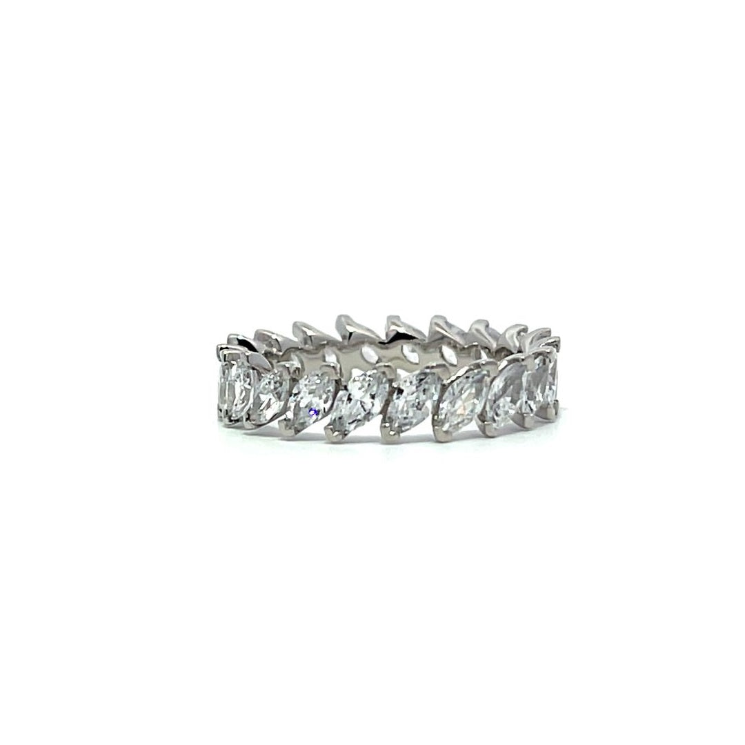 Silver marquise-shaped stone eternity ring on a white background