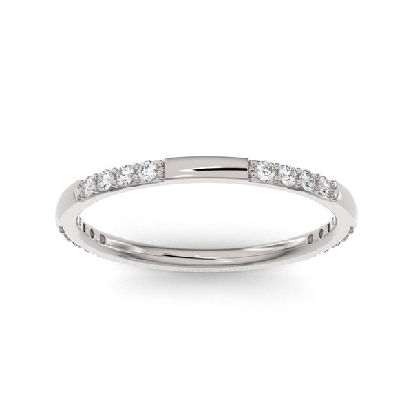 White gold band ring with rows of diamonds on a white background.