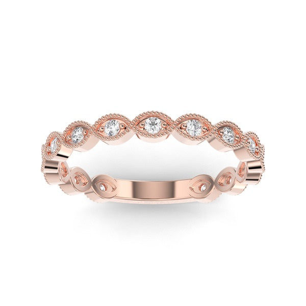 Rose gold wedding band with diamond accent on a white background.