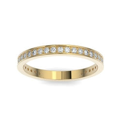 Gold wedding band with diamond accent on a white background.