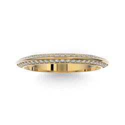 Gold wedding band with diamond accent on a white background.