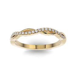 Gold wedding band with diamond accent on a white background.