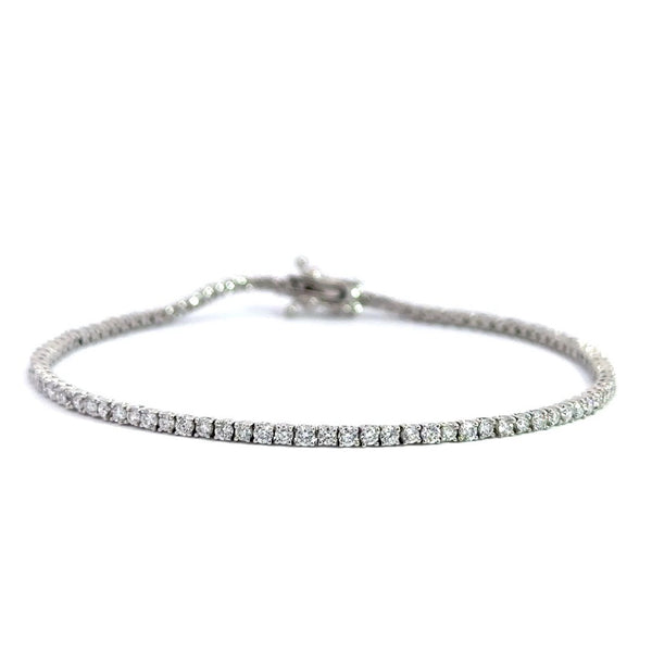 Silver diamond tennis bracelet on a white background.