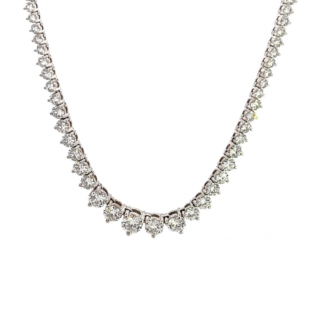 White gold diamond tennis necklace on a white background.