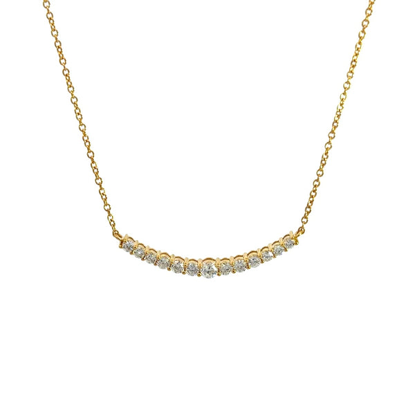 Yellow gold diamond necklace on a white background