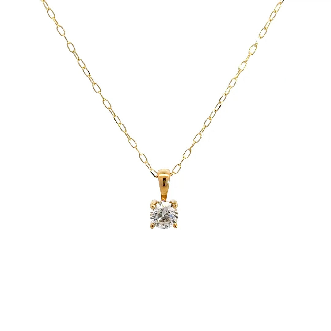 Yellow gold diamond solitaire necklace on a white background.