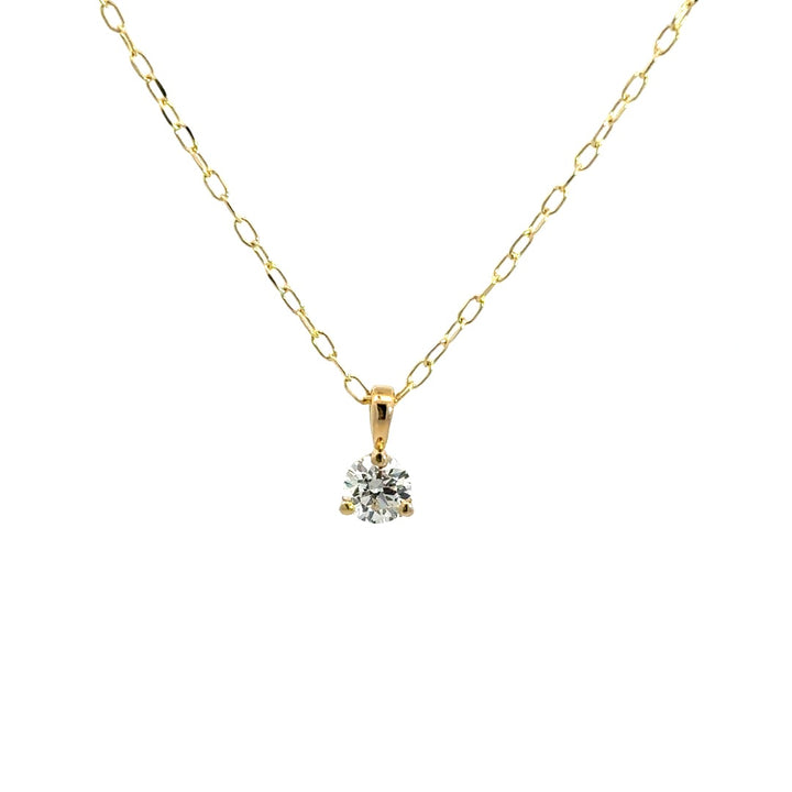 Yellow gold diamond necklace on a white background.