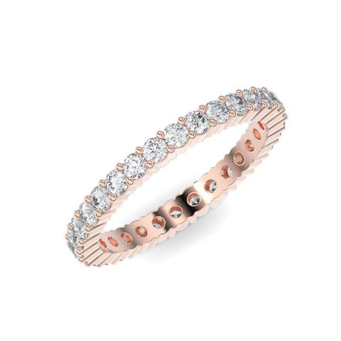 Rose gold wedding band with diamond accent on a white background.