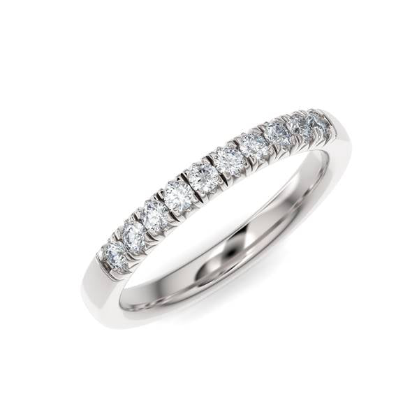 White gold wedding band with diamond accent on a white background.