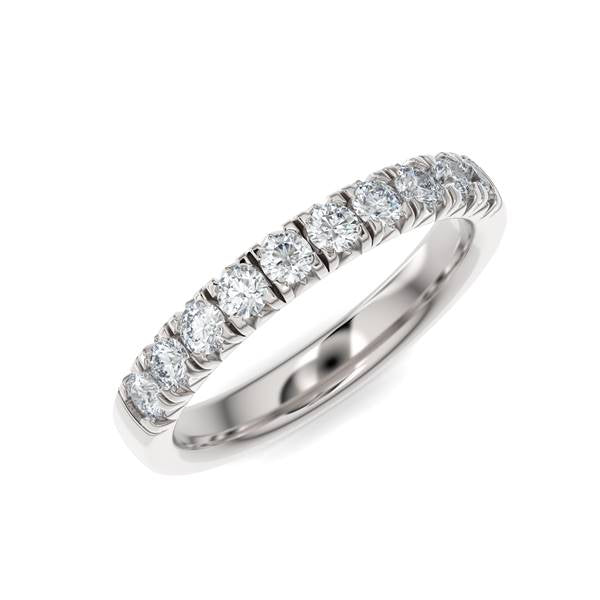 White gold wedding band with diamond accent on a white background.