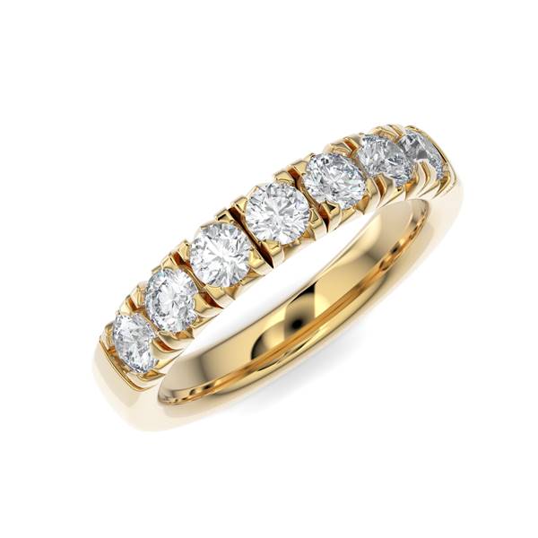 Yellow gold wedding band with diamond accent on a white background.