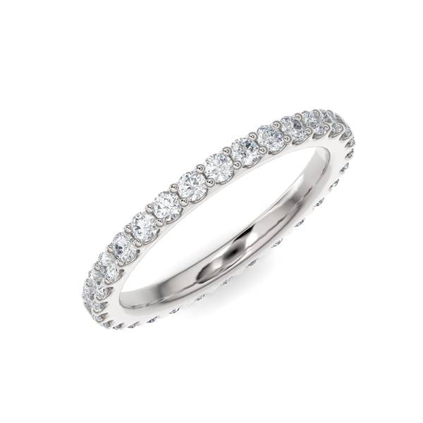 White gold wedding band with diamond accent on a white background.