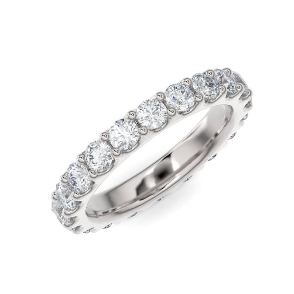 White gold wedding band with diamond accent on a white background.