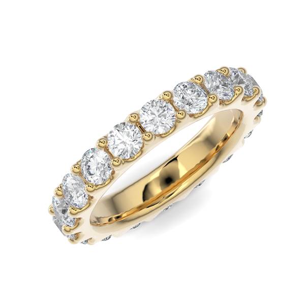 Yellow gold wedding band with diamond accents on a white background.