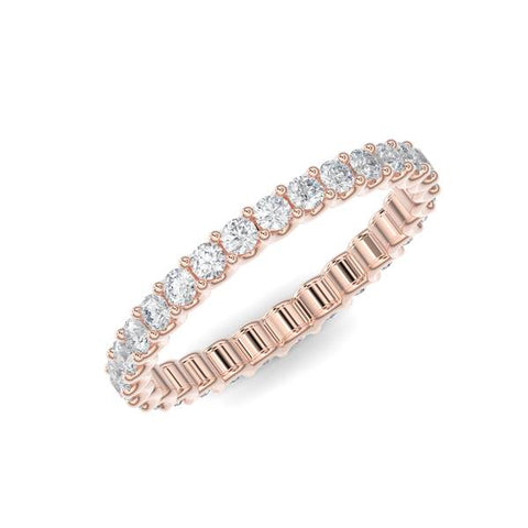 Rose gold wedding band with diamond accent on a white background.