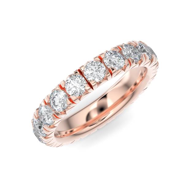 Rose gold wedding band with diamond accents on a white background.