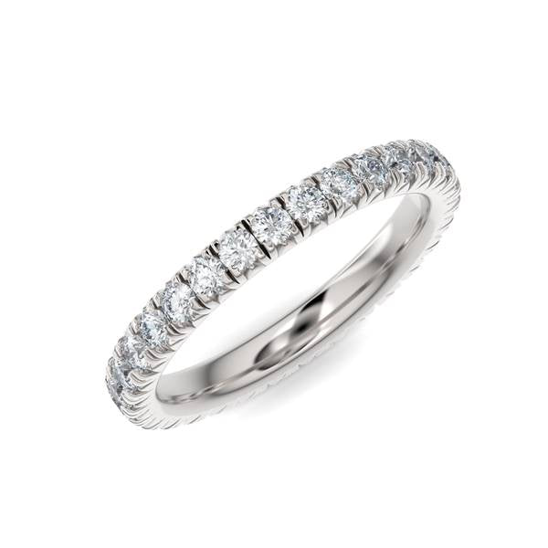 White gold wedding band with diamond accents on a white background.