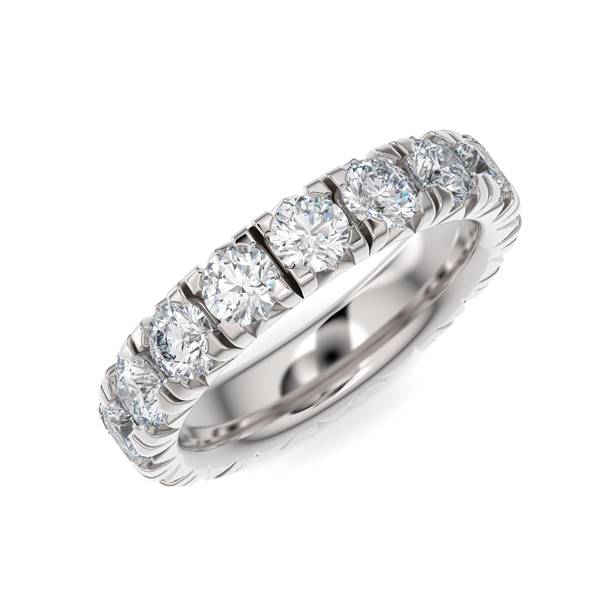 White gold wedding band with diamond accents on a white background.