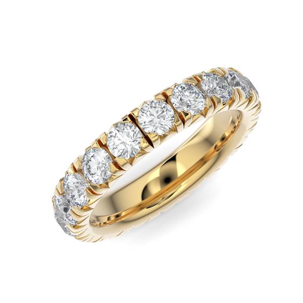 Yellow gold wedding band with diamond accents on a white background.