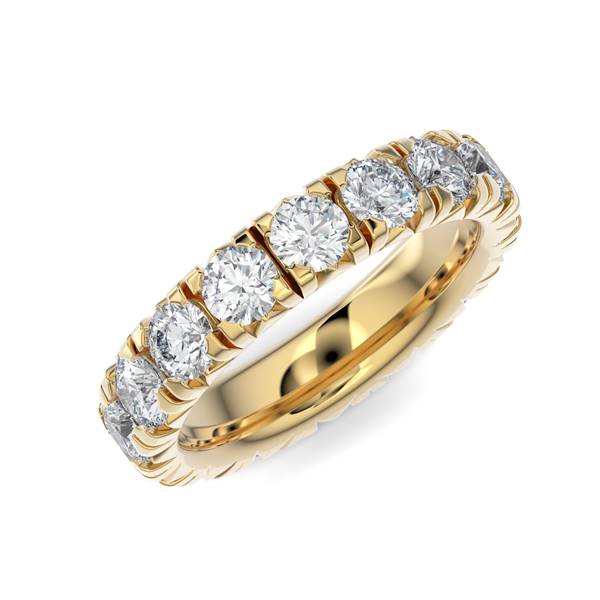 Yellow gold wedding band with diamond accents on a white background.