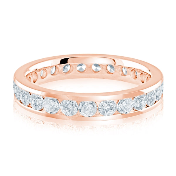 Rose gold wedding band with diamond accents on a white background.