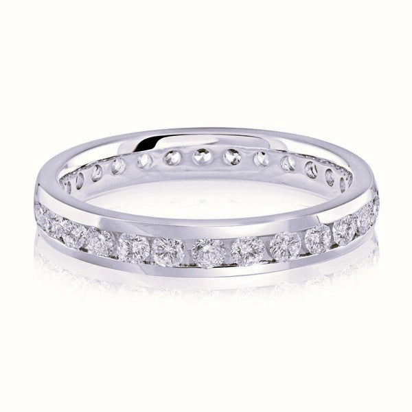 White gold wedding band with diamond accents on a white background.