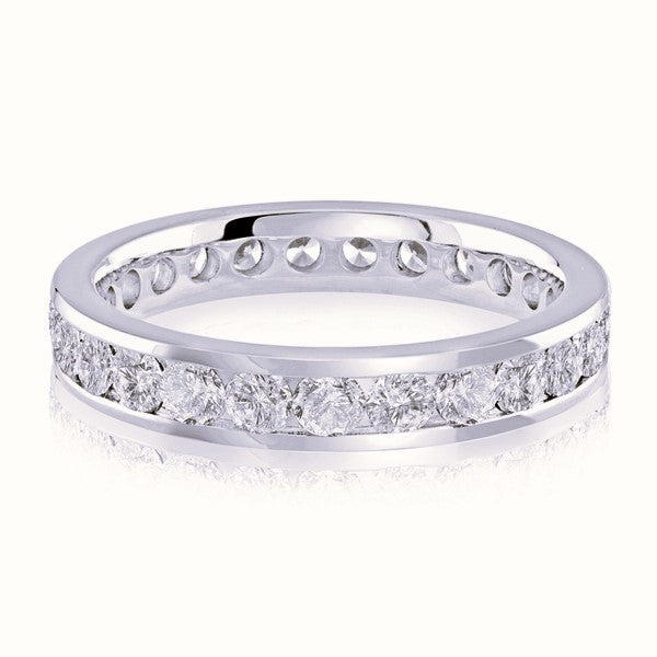 White gold wedding band with diamond accents on a white background.