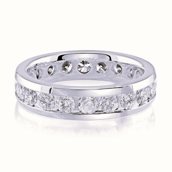 White gold wedding band with diamond accents on a white background.