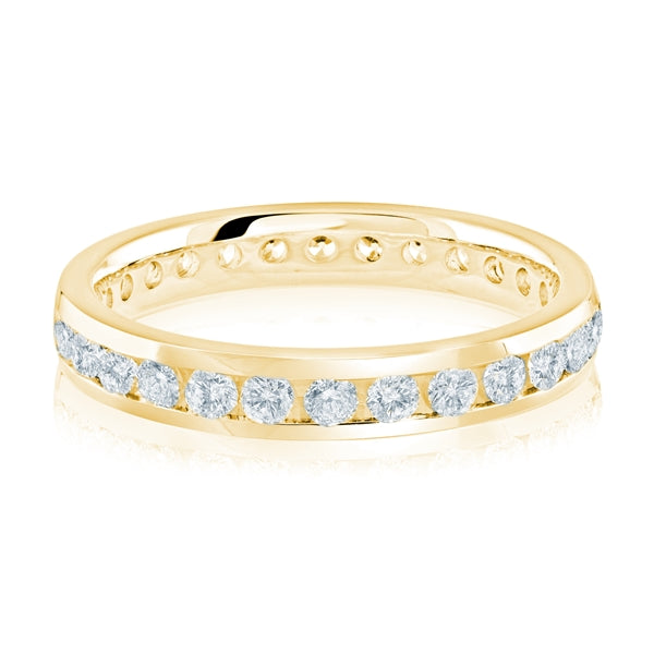 Yellow gold wedding band with diamond accents on a white background.