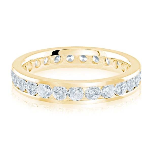 Yellow gold wedding band with diamond accents on a white background.