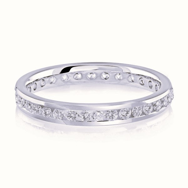 White gold wedding band with diamond accents on a white background.