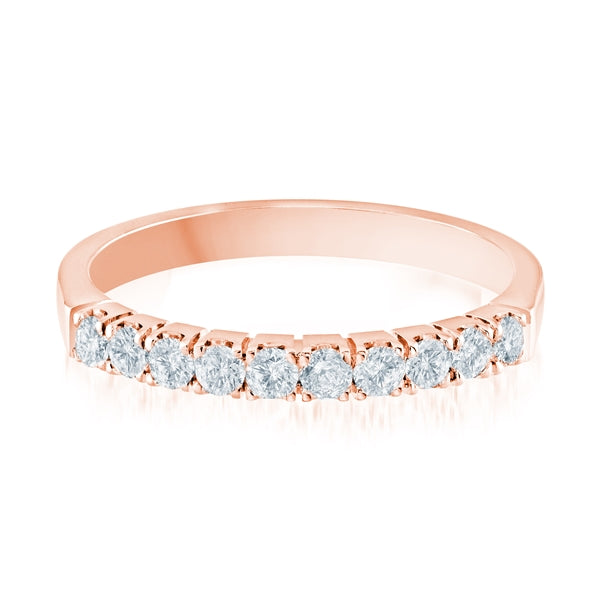 Rose gold wedding band with diamond accents on a white background.