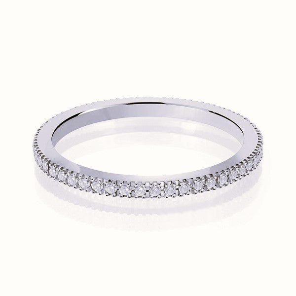 White gold wedding band with diamond accents on a white background.