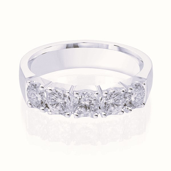 White gold wedding band with diamond accents on a white background.