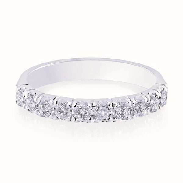 White gold wedding band with diamond accents on a white background.